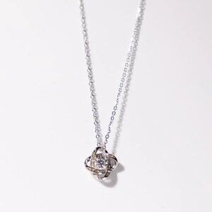 IRAMAT Crystal Flower Pendant Necklace - Elegant Sparkling Jewelry for Women
